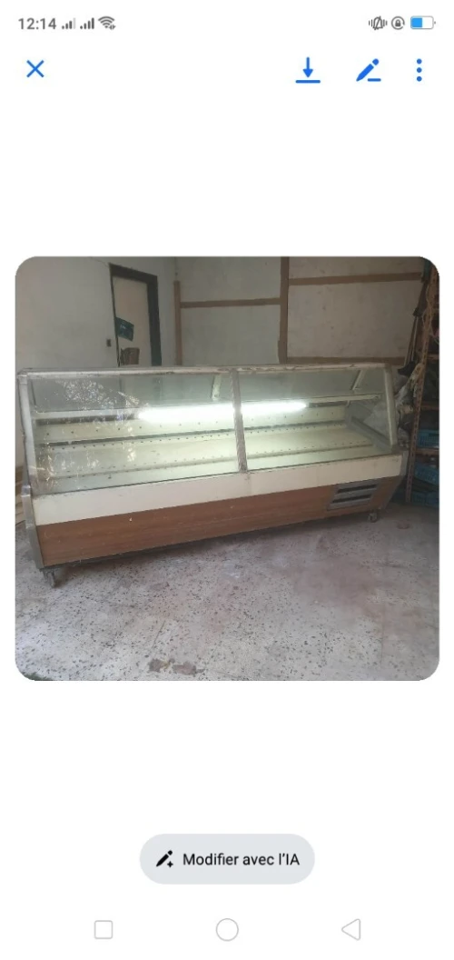 1vendre  présentoir drès bon état