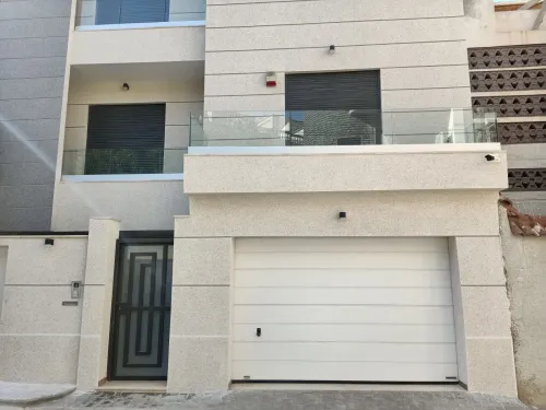 porte sectionnelle / rideau électrique / porte automatique 