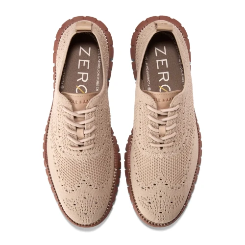 Cole Haan - Zerogrand Remastered Stitchlite Wingtip Lt Sesame   Sesame  Dk Cuoio