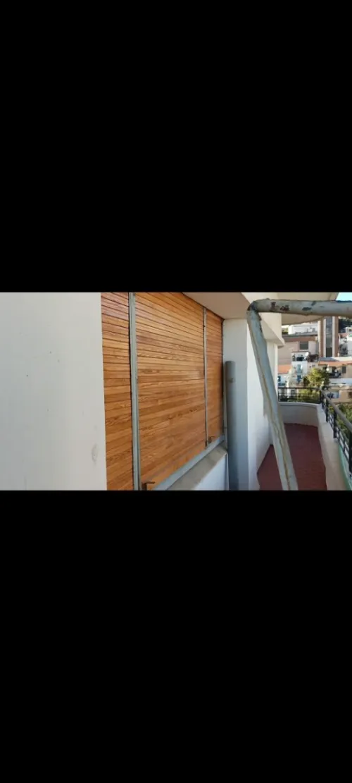 Installation et maintenance du volet bois