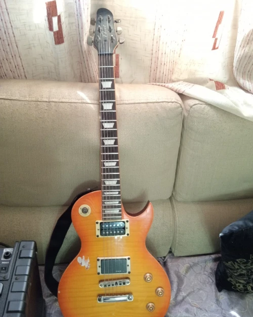 Guitare +ampli Roland Cube 15w