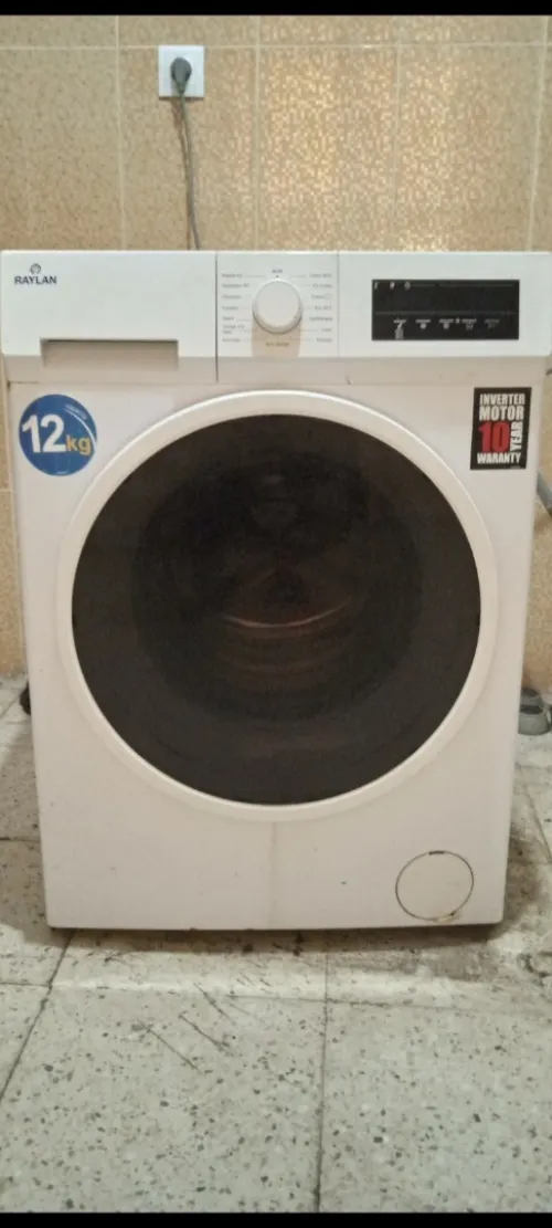 Vente de machine à laver Raylan 12kg en panne. Problème de carte mère du moteur.