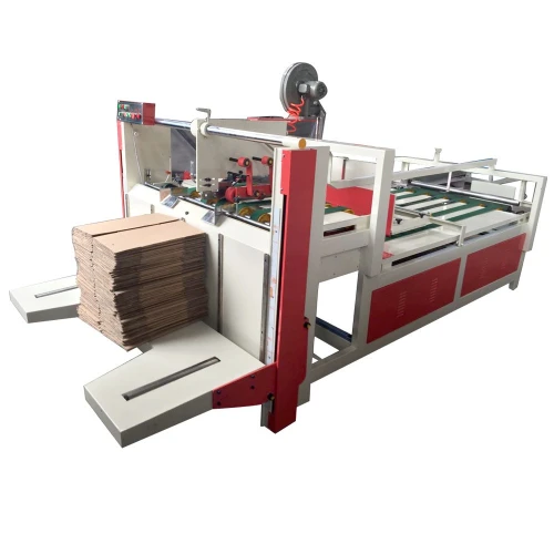Machine Plieuse Colleuse Carton الة طي الكرطون 