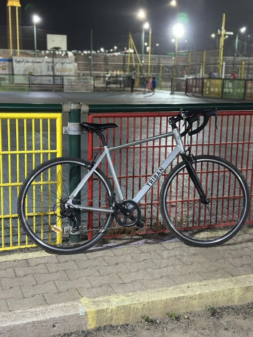 Vélo course triban RC 100