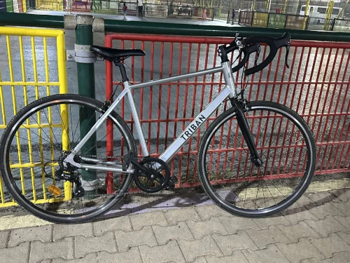 Vélo course triban RC 100
