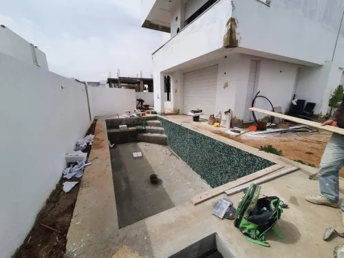 Construction des piscines مسابح