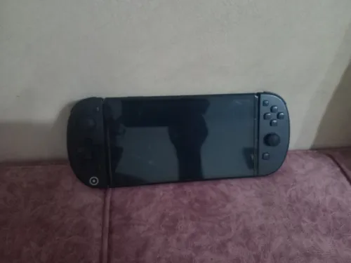 Nintendo switch oled flache wm3amar bles jeux