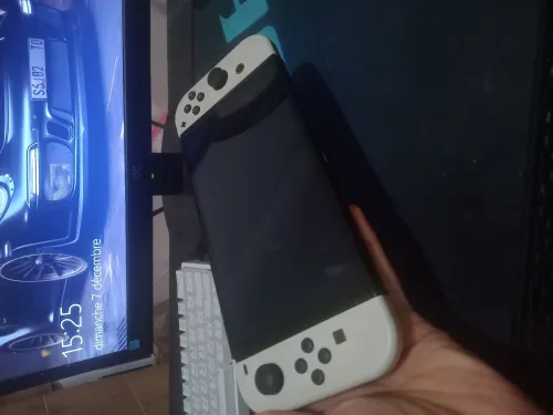 Nintendo switch Oled online état neuf