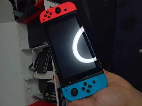 Nintendo switch V2 flache état neuf +40 jeux