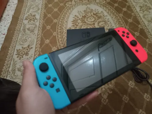 Nintendo switch flache puce +35 jeux