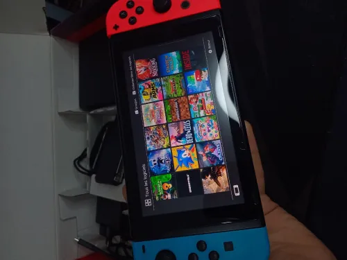 Nintendo switch V2 flache état neuf +40 jeux