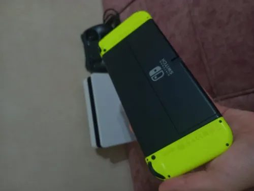 Nintendo switch oled état neuf +40 jeux