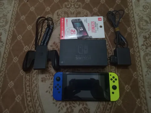 Nintendo switch V2 flache 10/10 + 38 jeux
