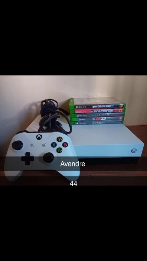 Xbox one x avec 5 CD