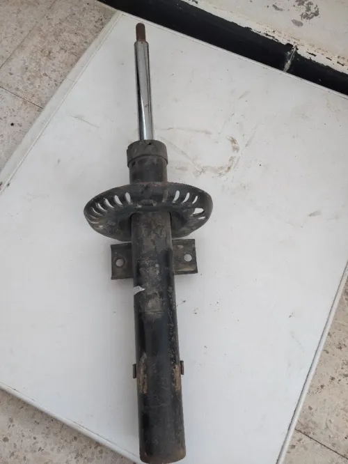 Amortisseur+cache roue de secours pour  POLO 2005