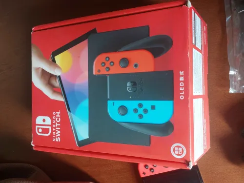 Nintendo switch Oled non flashée + 2 jeux