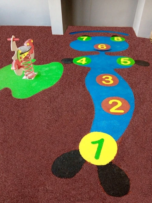 SOL AMORTISSANT revetement pour aire de jeux et parcs