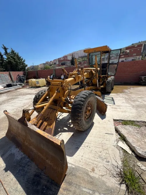 niveleuse komatsu appelez ce numéro 