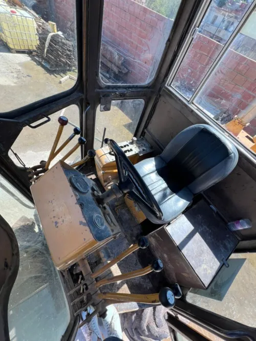 niveleuse komatsu appelez ce numéro 