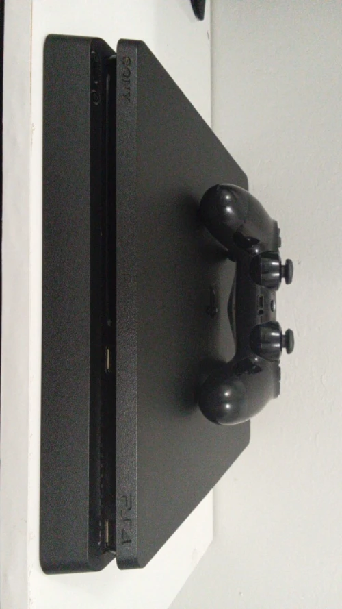 Original Playstation 4 slim 1TB version 13.50+1 manette sans fil