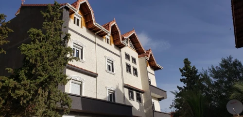 Monocouche et mocheté écrasé façade 