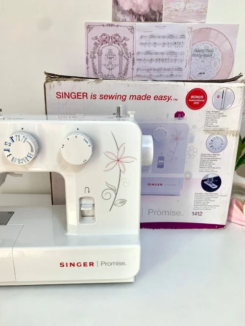 Machine à coudre singer promise 1412