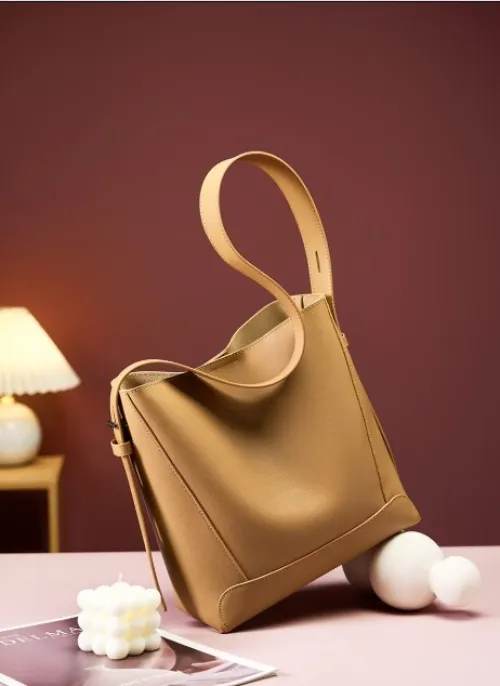 Sac seau en cuir véritable pour femme, printemps été 2026, grande capacité, bandoulière polyvalente pour le travail