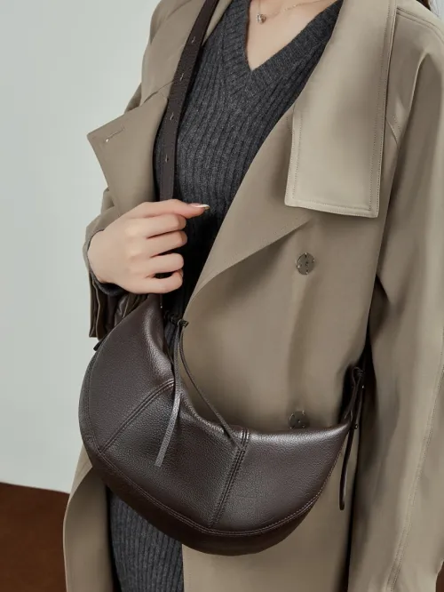 Sac croissant en cuir de vache pleine fleur, style dumpling, nouveau modèle, niche, bandoulière, pratique, couleur unie, cuir souple pour femme