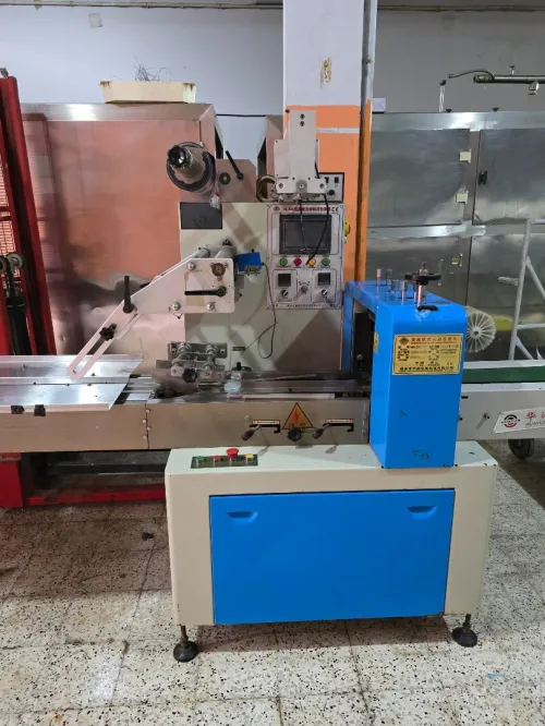 وصف Machine de conditionnement Flow pack 450