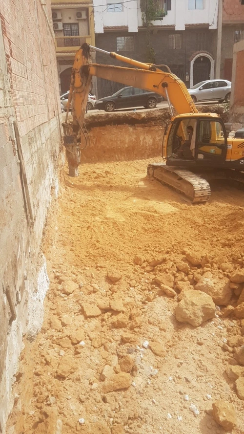 Entreprise de construction et de réalisation مقاول بناء