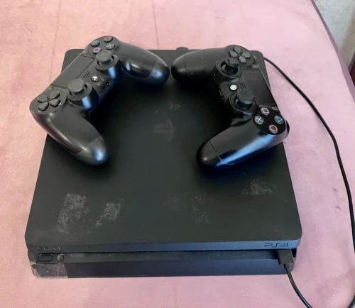 PS4 Slim flashé 1Tb. 