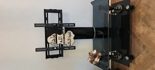 Meuble TV en verre trempé avec support intégré. طاولة تلفاز بزجاج مقوى مع حامل شاشة مدمج