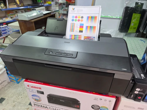 Imprimante jet d'encre couleur EPSON L 1300 en très bonne occasion avec emballage imprimé environ 80f