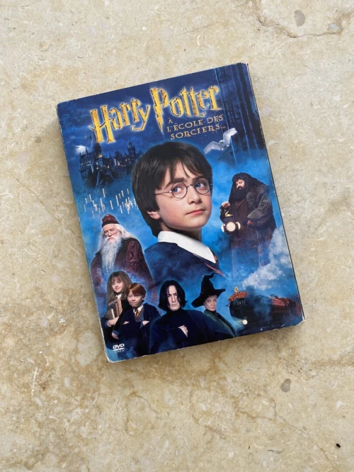 Lecteur DVD portable avec 2 écrans + film original de harry potter