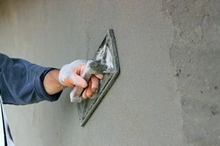 Crépissage et finition. Maçonnerie