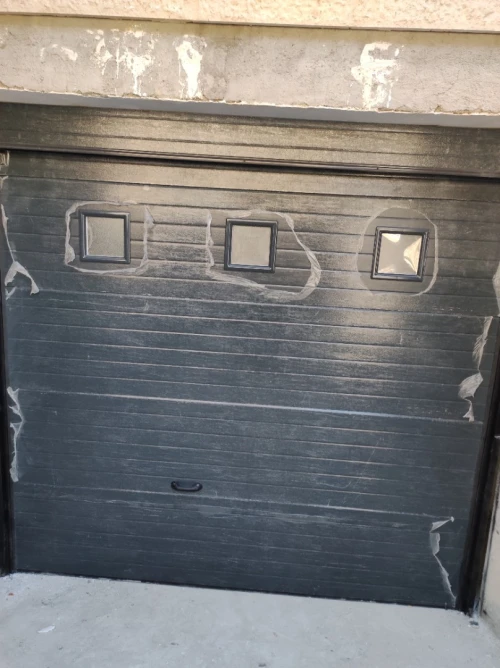 Porte sectionnelle / portail automatique