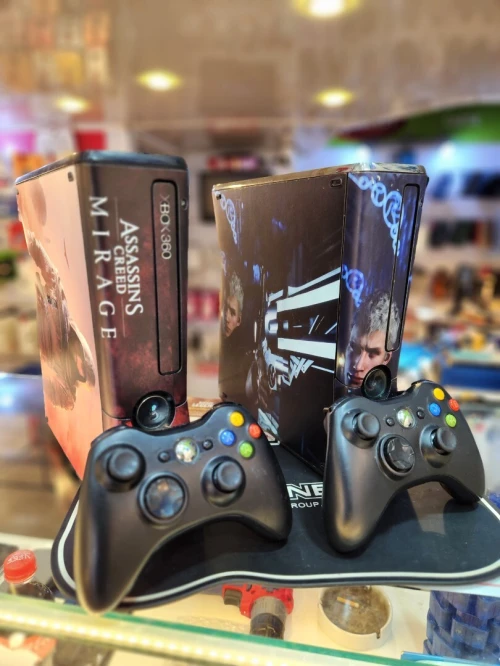 Xbox 360 slim + 40 jeux Xbox 360 slim + 40 jeux