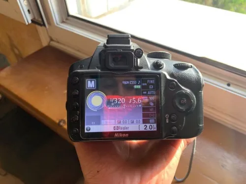 Nikon D3200 + عدسة 55-200mm بحالة ممتازة -  فرصة ما تتفوتش!