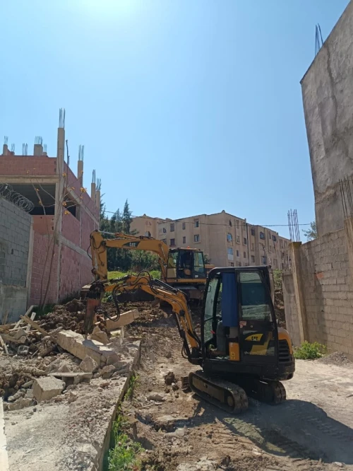 للكراءLocation  Pelle Pneumatique Caterpillar M312