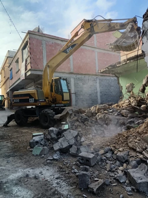 للكراءLocation  Pelle Pneumatique Caterpillar M312