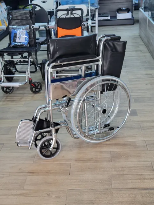 Fauteuil roulant simple cuire 