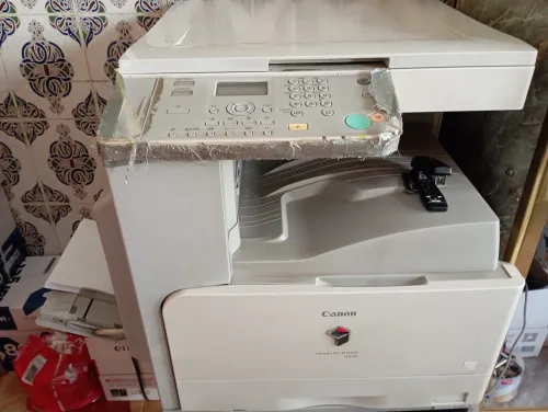 Canon. .. kyocera 