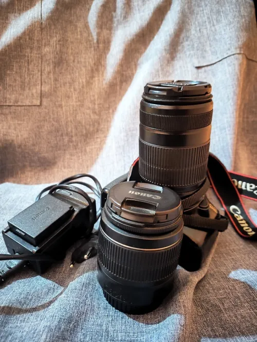 Canon 1300D camera available with 18-55mm and 50-250mm lenses and battery charger