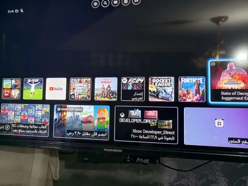 Xbox one s avec les CD es manettes