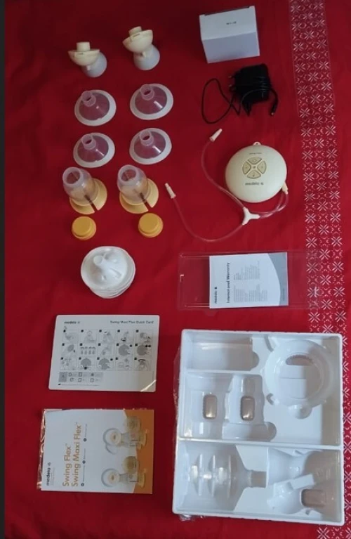 Tire lait électrique Medela Swing Maxi Flex (comme neuf)