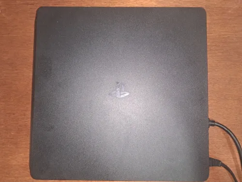 Ps4 slim 500 gb bonne occasion avec 8 jeu sans manette