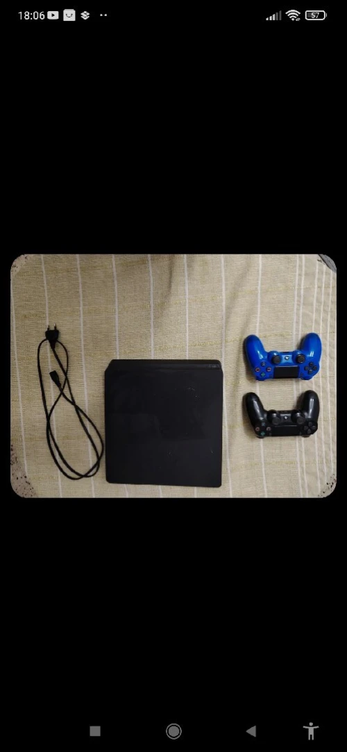 PS4 Slim 500 Go + 2 manettes + FIFA 23  Très bon état