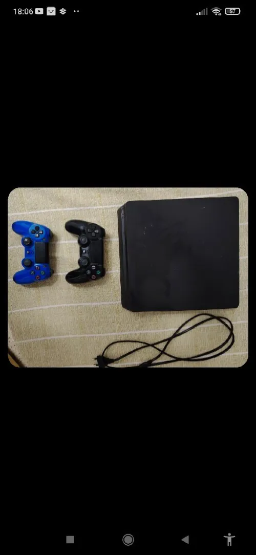 PS4 Slim 500 Go + 2 manettes + FIFA 23  Très bon état