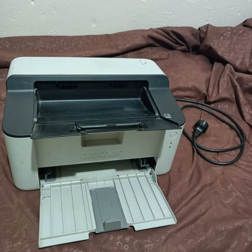 طابعة Brother HL-1110 مستعملة تمشي 10/10 imprimante
