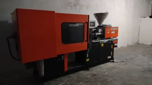 Machine injection plastique 90TN 